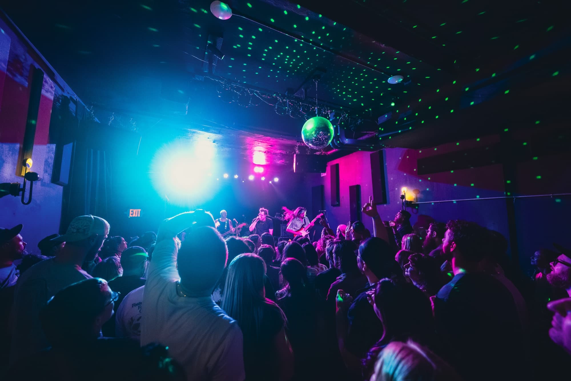 Crowd with disco ball and stage lights