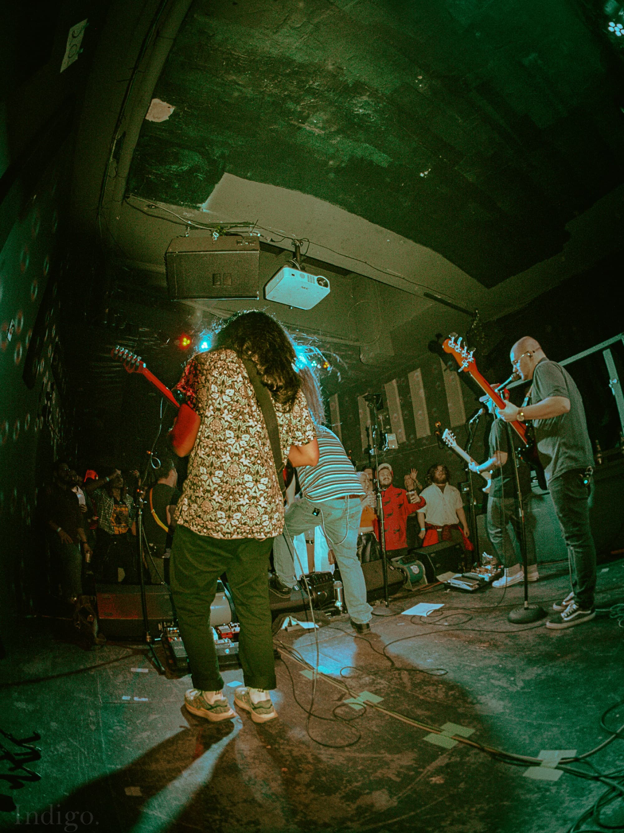 Wide-angle view from stage with guitarist