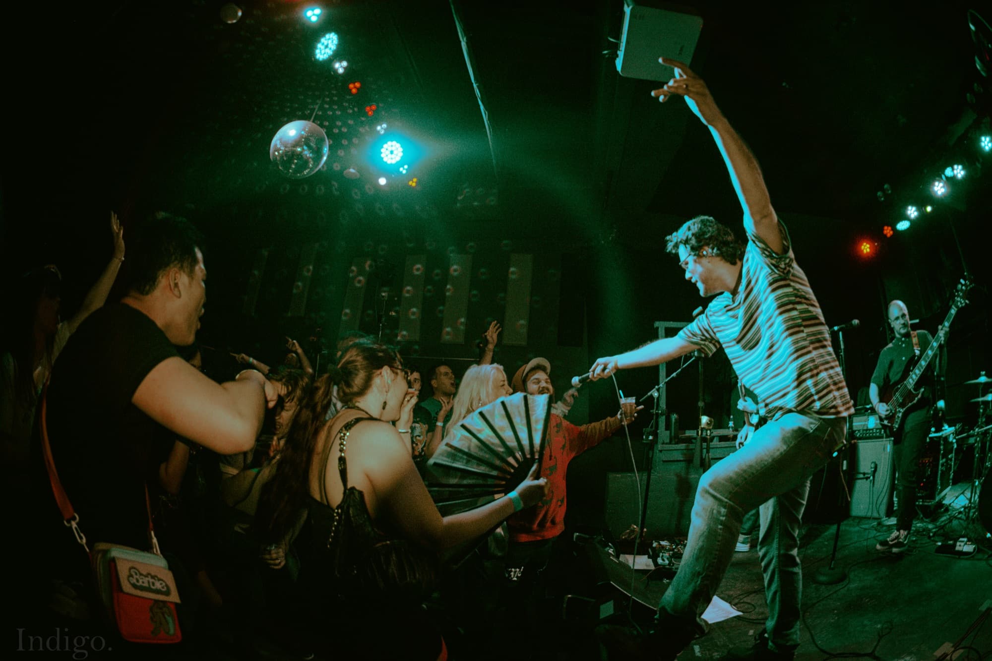 Vocalist reaching out to crowd